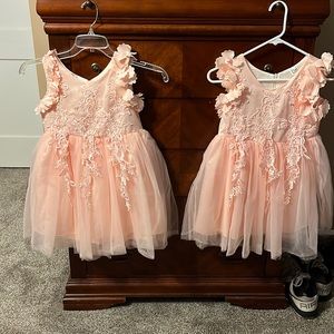 A pink,coral dress a size a youth 14